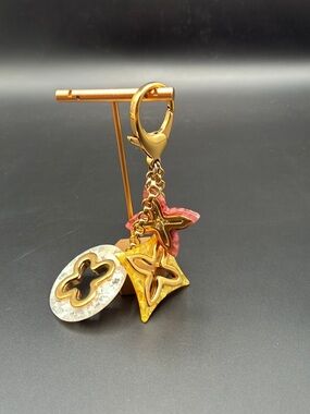 Louis Vuitton Insolence Bag Charm
Multicolor Resin Flowers